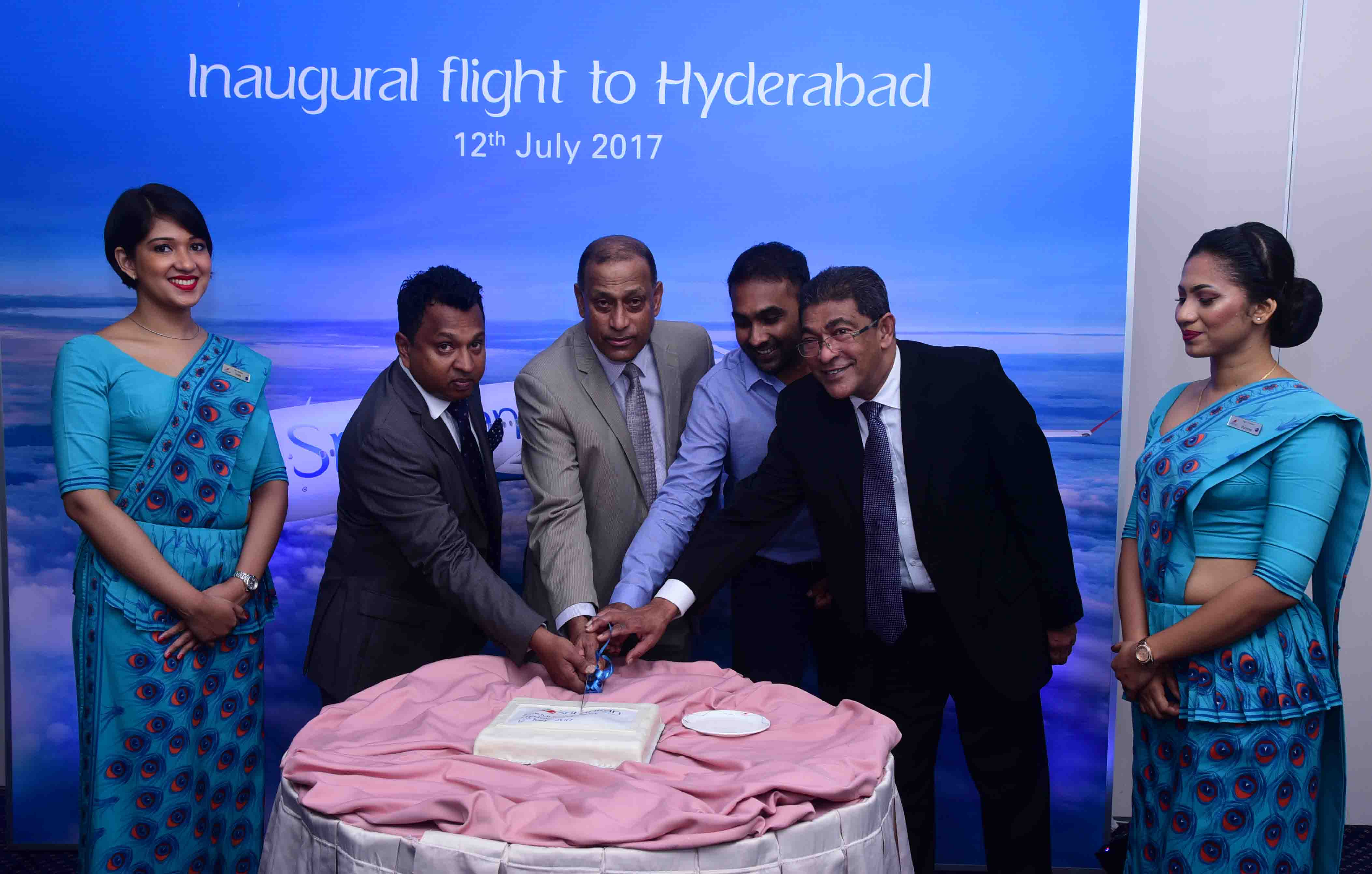 SriLankan Airlines, Director Mr. Harendra K. Balapatabendi together with Chief Commercial Officer Mr. Siva Ramachandran, Brand ambassador of SriLankan and former Sri Lanka Cricket  Captain Mr. Mahela Jayewardene and  SriLankan Airlines, Consultant Mr. Lal Perera cutting a cake minutes before the inaugural  flight to Hyderabad yesterday