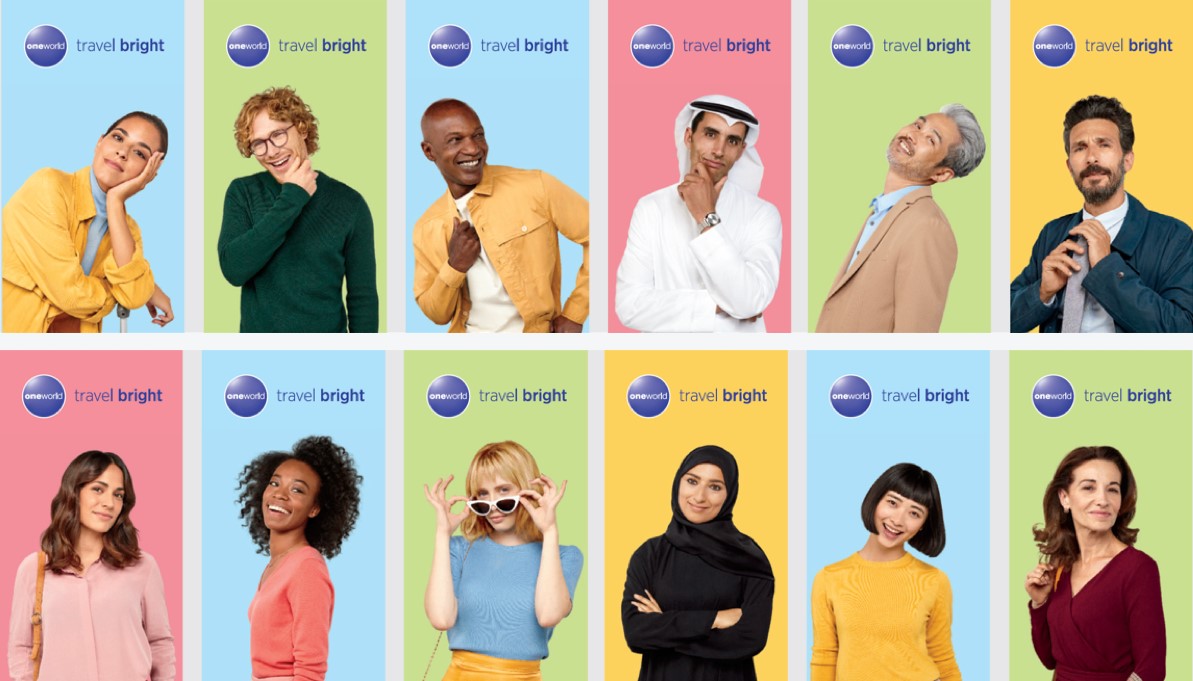 people from countries all over the world posing with the oneworld logo
